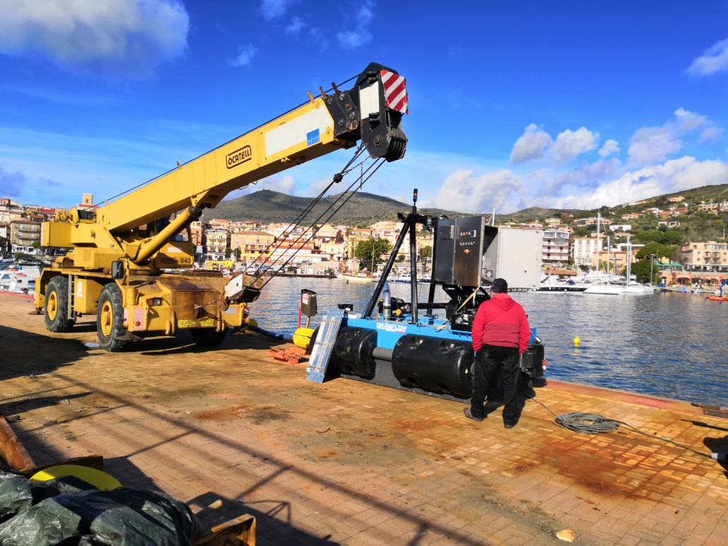 Port dredging with remote controlled dredge 1