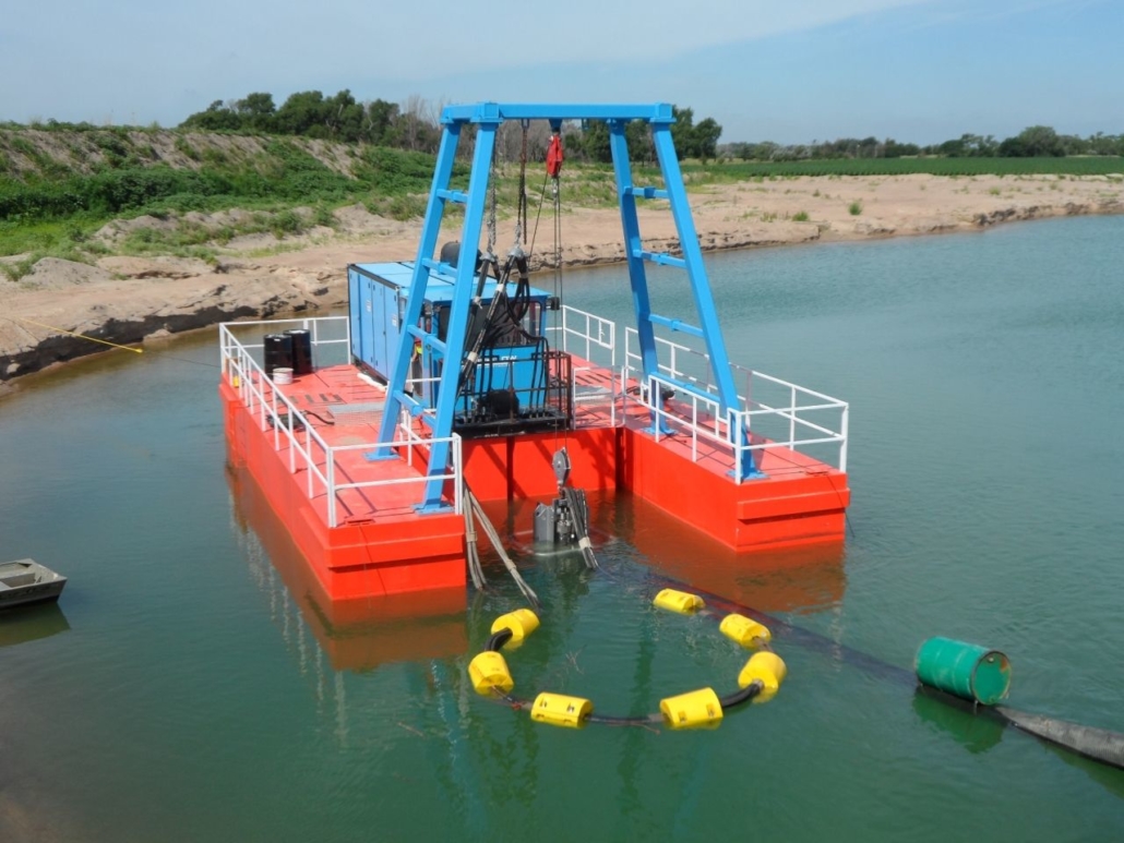 Extraction of sand and gravel with a cable dredge